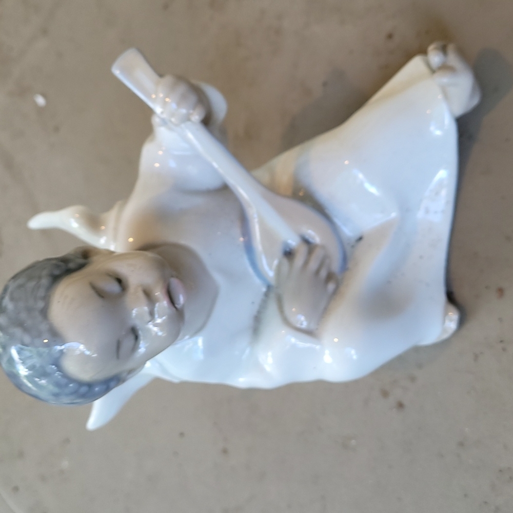 Lladro vintage angel-black-playing lute. No cracks or chips.